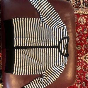 Black and white striped sweater.